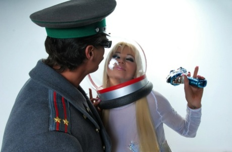 Hot blonde Nikita Von James models futuristic apparel next to a military man 14353915