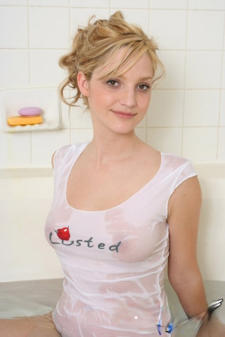 Nice teen girl shows off her thong adorned butt in a wet T-shirt 41763798