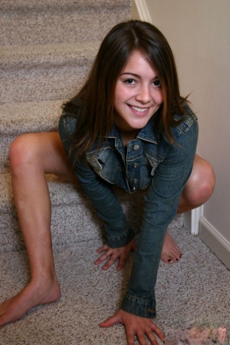Barely legal solo girl sports underboobage in a red thong on stairs 43094309