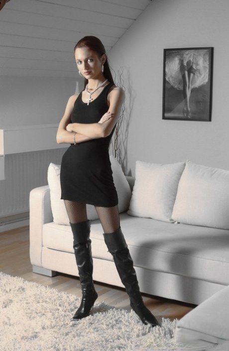 Dark haired glam model in a black dress rips off her fishnet pantyhose 54535088