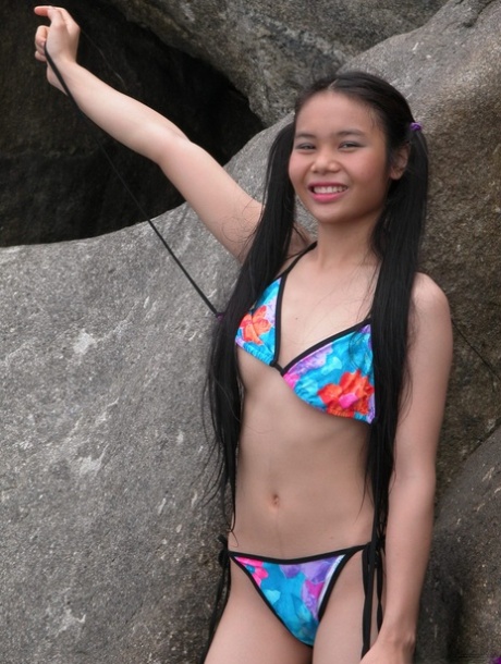 Delicious 18 year old Asian girl gets naked at the beach & shows her hot body 29923274