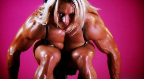 Middle-aged bodybuilder Brigita Brezovac lifts weights in a bra and panty set 67728323