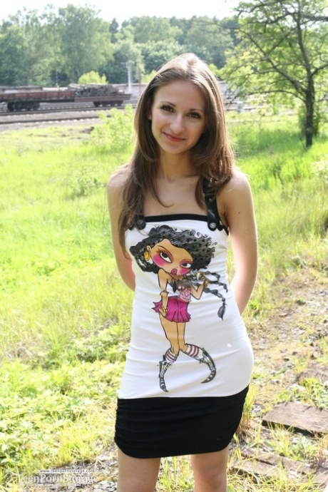Teen amateur Sveta exposes her tits and twat on railway tracks 32805382