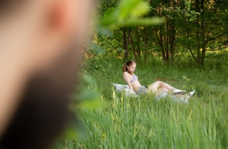 Young redhead Flicka Luchik wears her hair in pigtails during sex in a meadow 28295786