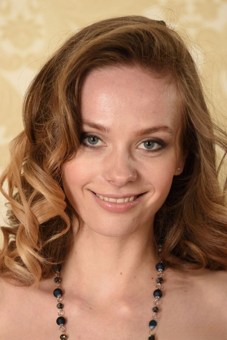 Barely legal girl Irene models totally naked with a smile on her face 61840026