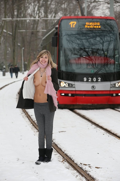 Sexy blonde teen Holy flashes her tits and twat in public on snow clad ground 57635655