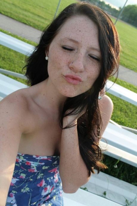 Teen solo girl Freckles 18 exposes her upskirt panties at a ball diamond 80169236
